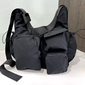 “It’s All About The Pockets Bag” Men's/Women’s Nylon Black Crossbody Bag
